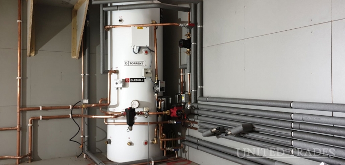 Thermal store linking multifuel boiler and oil boiler installed by United Trades